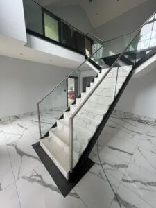 Modern glass balustrade staircase furniture with sleek safety glass design