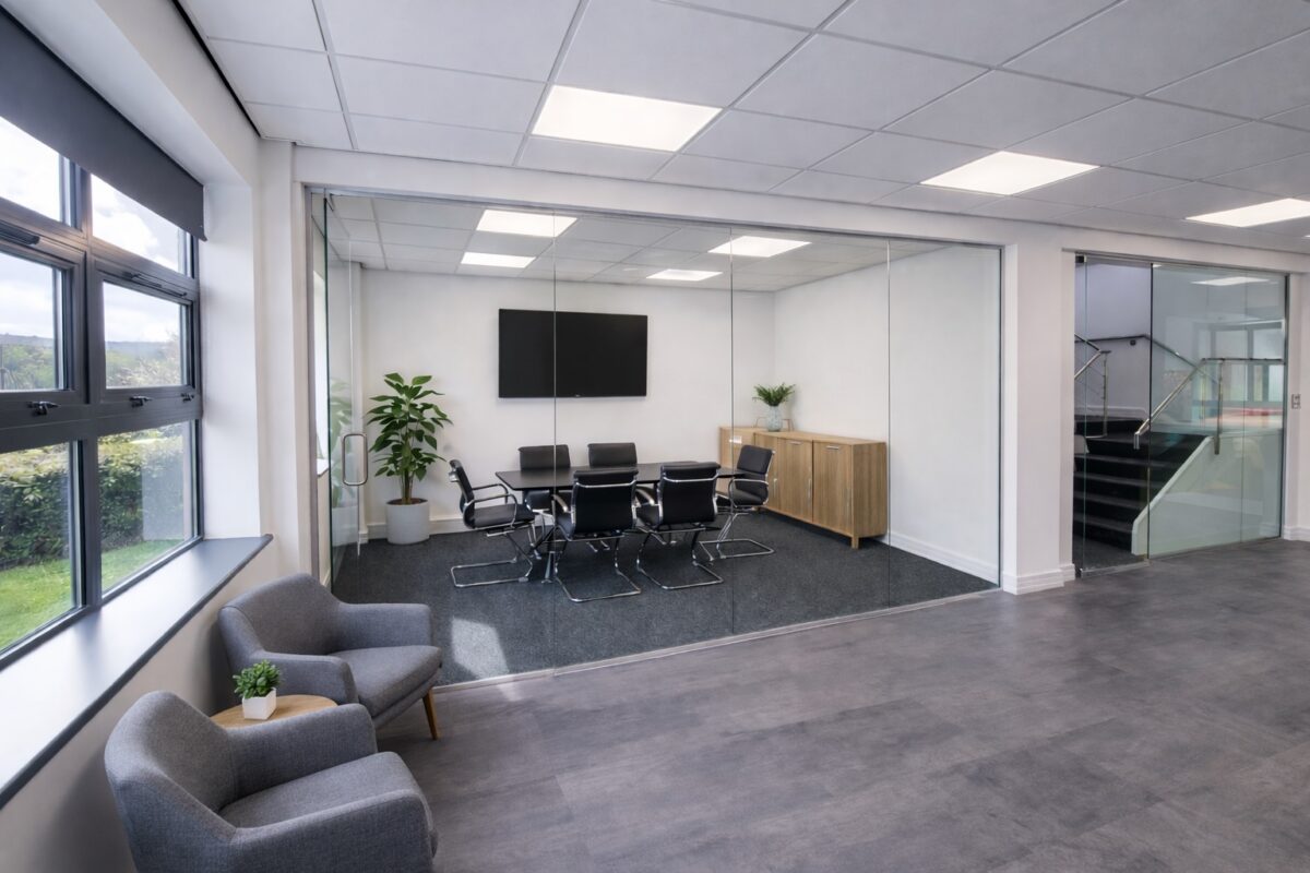 Frameless glass executive boardroom partition