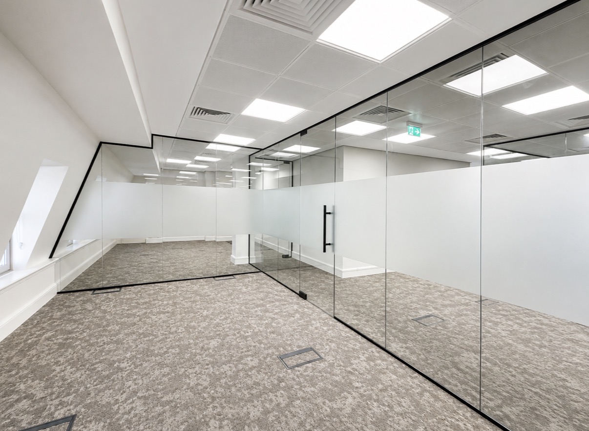 Glass partitioned office rooms with manifestation band at 24–26 Minories London